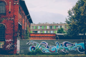 Germany, Saxony-Anhalt, Dessau, building, old, wall, graffiti, Federal Environmental Agency in the background Germany, Saxony-Anhalt, Dessau, building, old, wall, graffiti, Federal Environmental Agency in the background